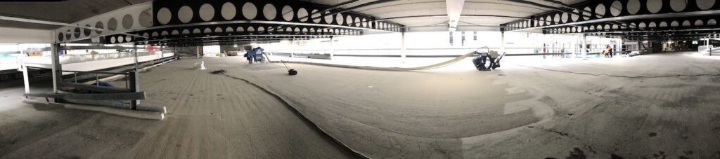 wide shot of warehouse floor dust free shot blasting