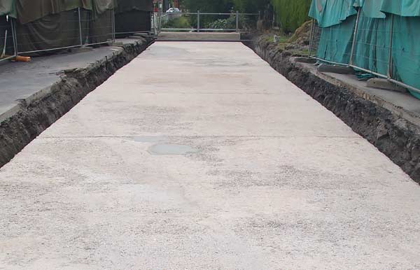 concrete floor of bridge being shot blasted