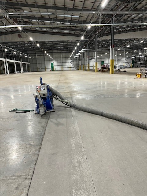 Captive Shot Blasting a Polished Concrete Floor